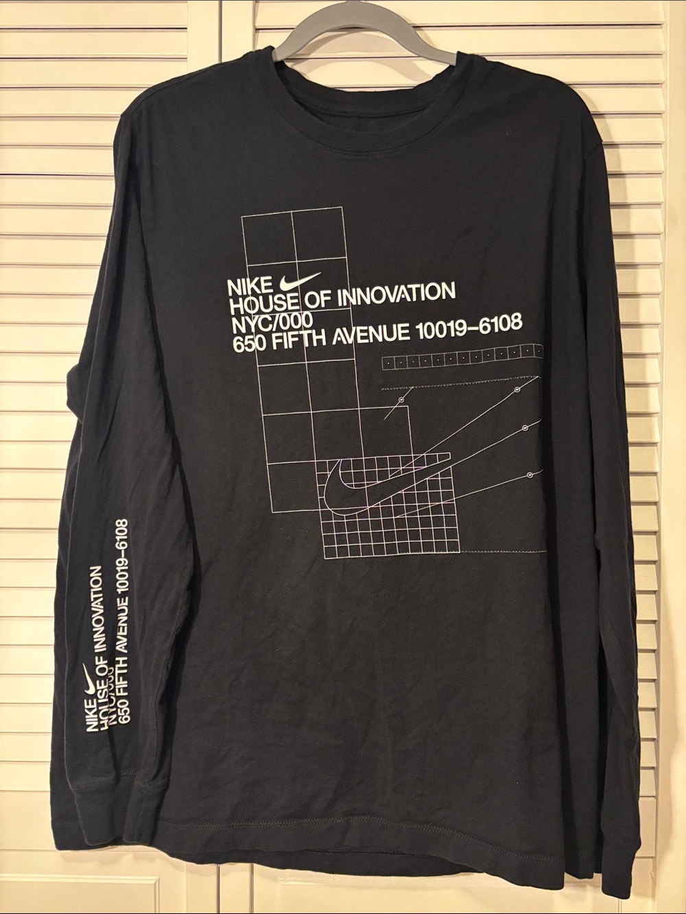 Nike Black Long Sleeve Graphic Tee with White Swoosh